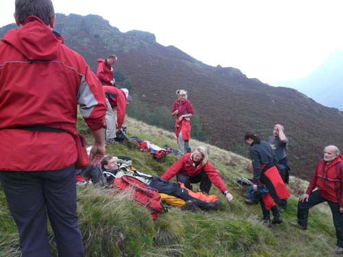 First aid is administered, while Mike (blue top) realises it's Monday, and several days has gone missing from his life, having attended the Langdale Folk Festival, where over £500 was raised and split between ourselves and the 'Fix the Fells' project.