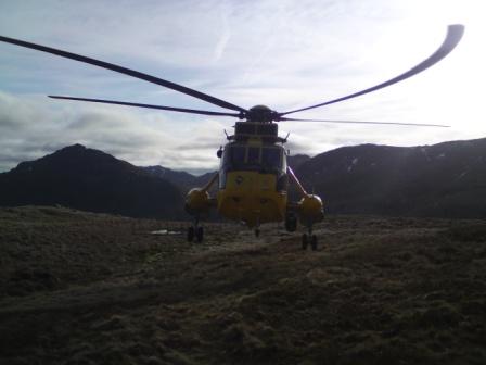 Helicopter approaching Bowfell