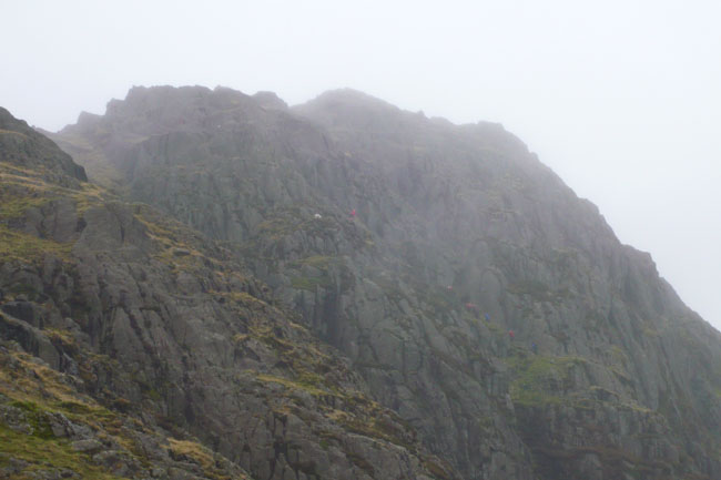 Everyone makes their way to the top of the crag