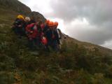 Evacuation down steep scree.