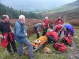 A quick count of the casualty's legs on the descent to check they all remain accounted for.